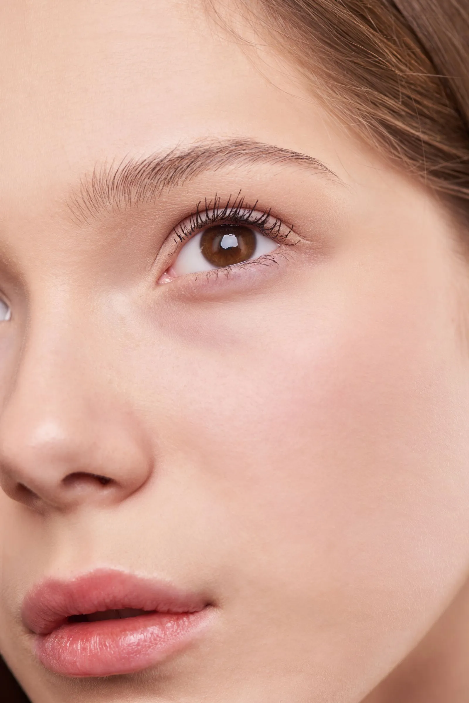 A close-up of a woman’s clear, natural skin